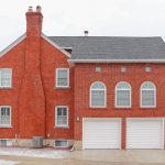Masonry chimney in a brick house